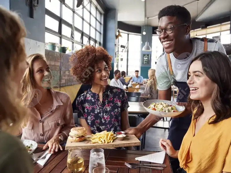 waiter_serving_food_women_restaurant_2007_2600x1950.jpg.webp
