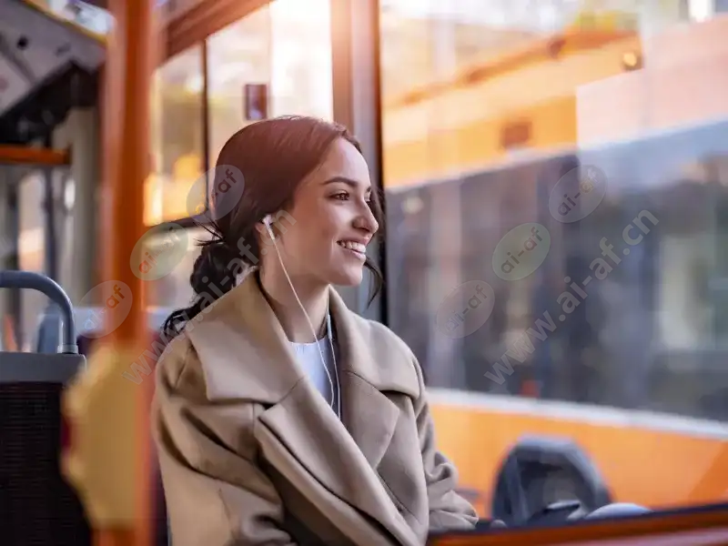 woman_seated_public_transport_bus_earphones_2303_hi-4-3Mediawithtext.jpg.webp